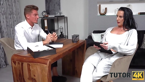 Hot milf with a sex toy in the kitchen